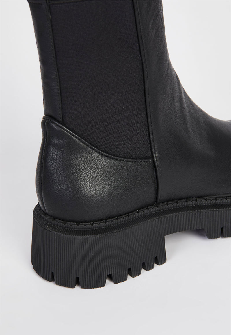 Guided Pull On Lug Sole Boot Black